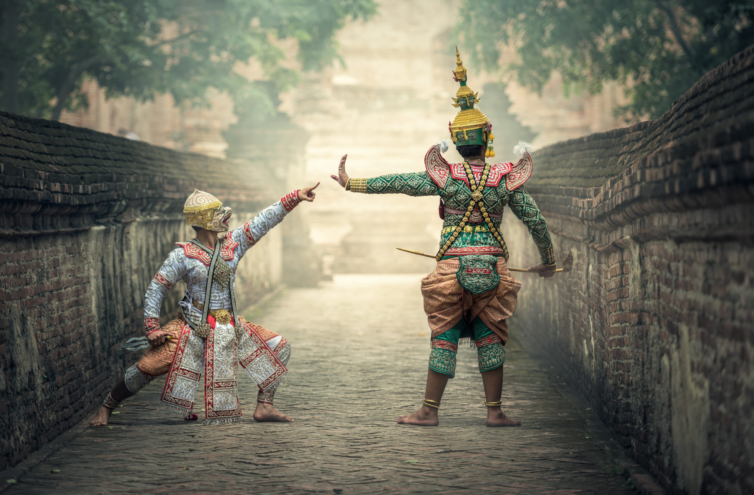 Traditional Thai Dancers performing outdoors in site-specic theatre